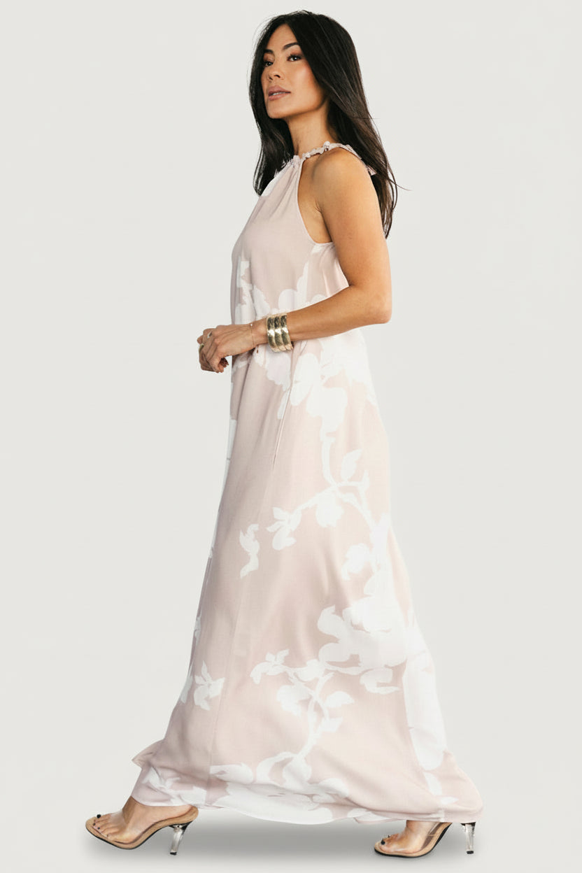 Model walking in the Aurelia Dress showcasing movement of the lightweight viscose fabric and relaxed silhouette.