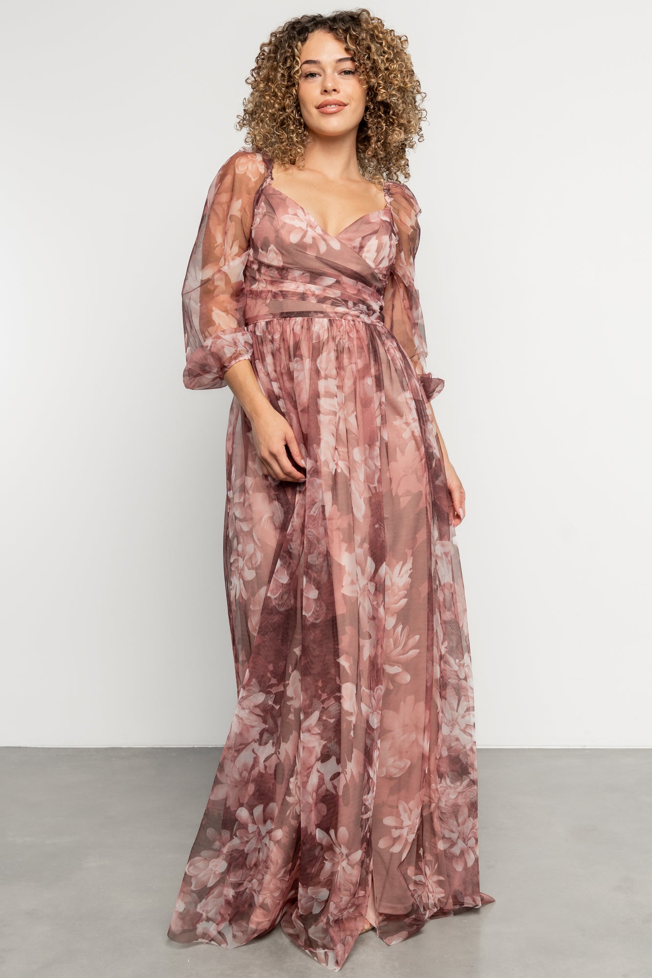 Full-length image of Nara Tulle Maxi Dress on model, displaying maxi silhouette, movement and styling with left leg slit.