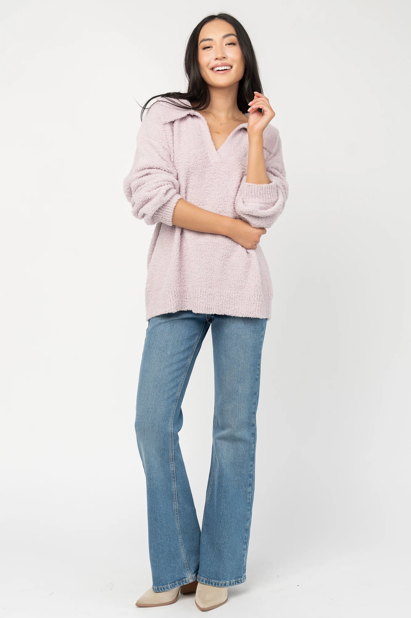 Lockwood Sweater in Dusty Lilac with fuzzy knit texture, collared V-neck, long sleeves, and ribbed cuffs and hem.
