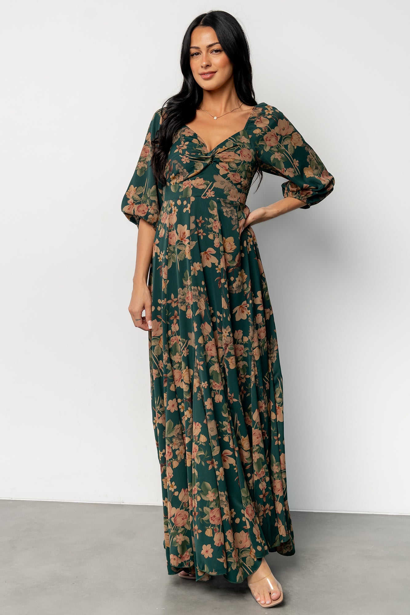 Styled product shot on white background showing full silhouette, print scale, and the dress's lightweight drape.