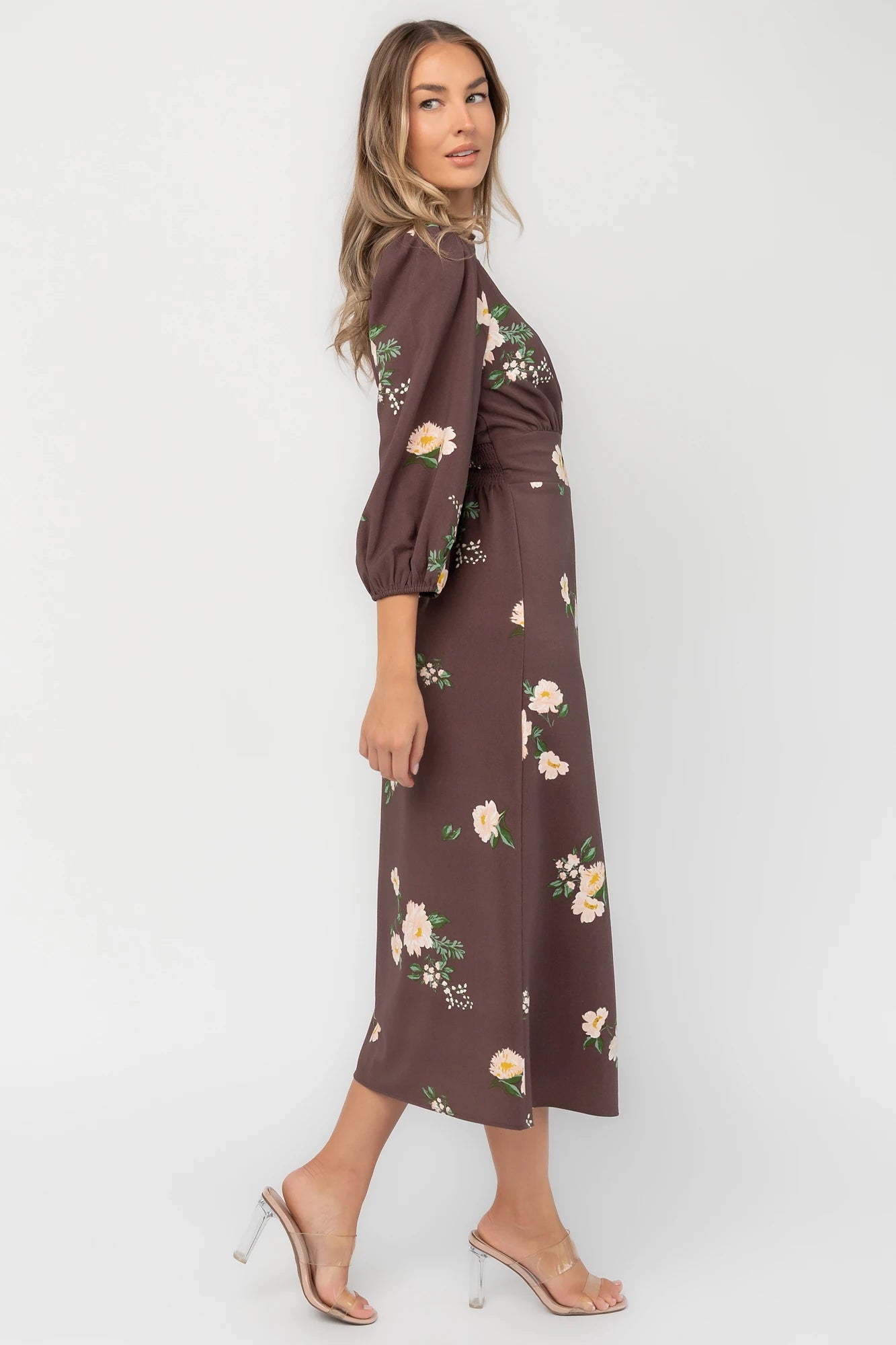 Clove floral chiffon maxi dress with a ruffled mock neckline, mid-length sleeves, smocked back waist, and flowing full-length skirt.