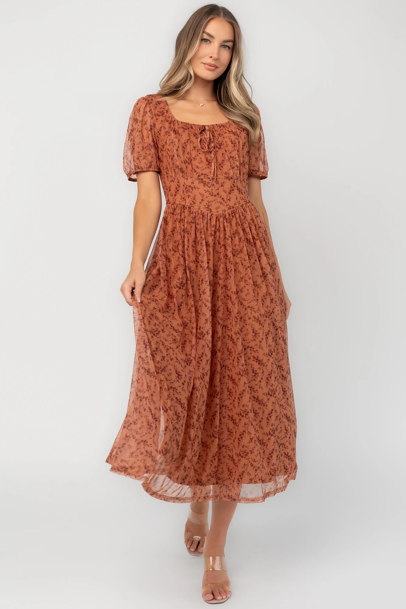 Spice floral mesh midi dress with a square neckline, short puff sleeves, fitted bodice, waist panel, and flowing midi skirt.