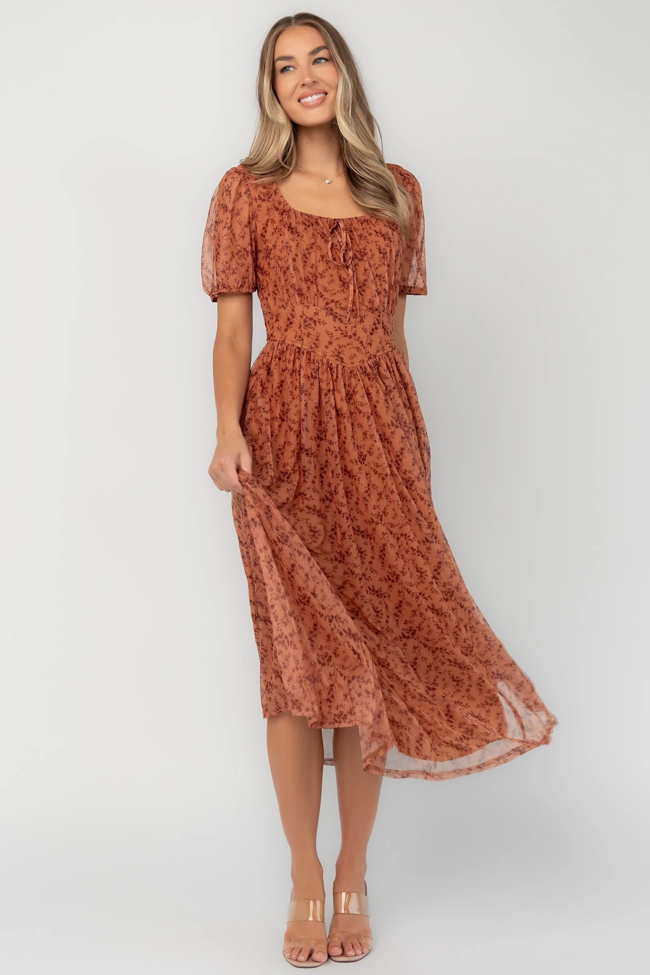 Spice floral mesh midi dress with a square neckline, short puff sleeves, fitted bodice, waist panel, and flowing midi skirt.
