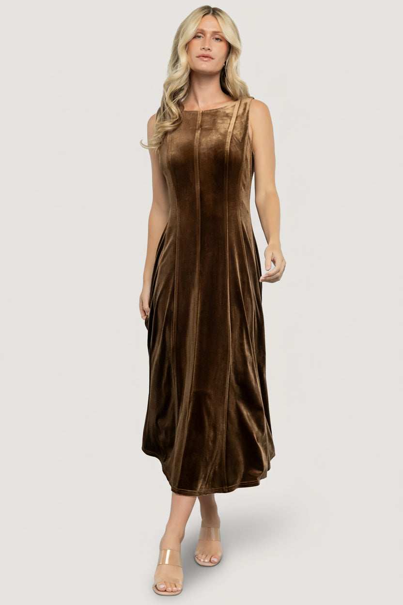 Styled look of the Annika Bronze velvet midi dress paired with heels, showcasing versatile styling for evening and holiday occasions.