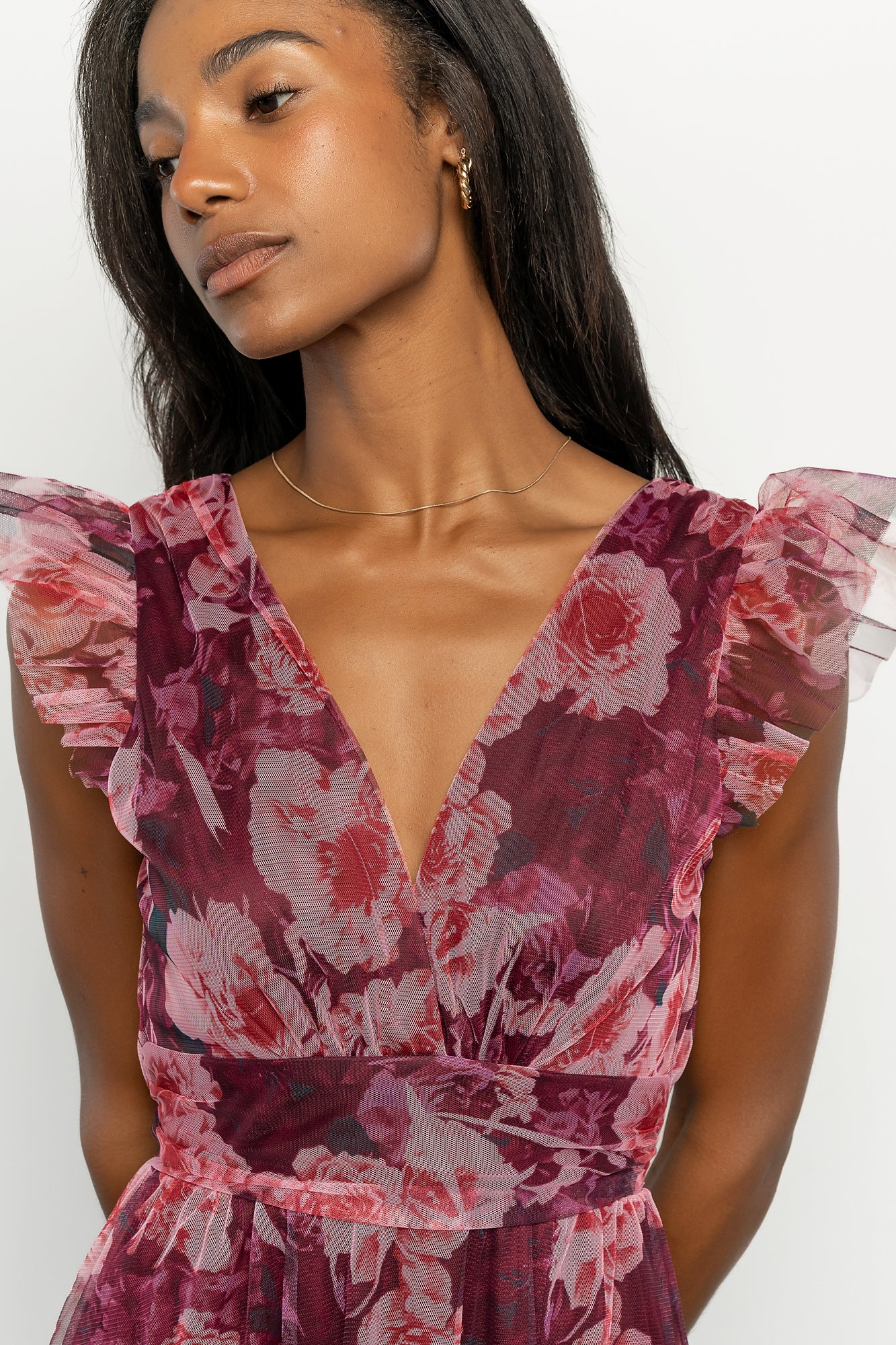 Close-up of Adelyn Maxi Dress fabric in Wine Floral, displaying tulle overlay texture, rose floral print, and stitched banded waist detail.