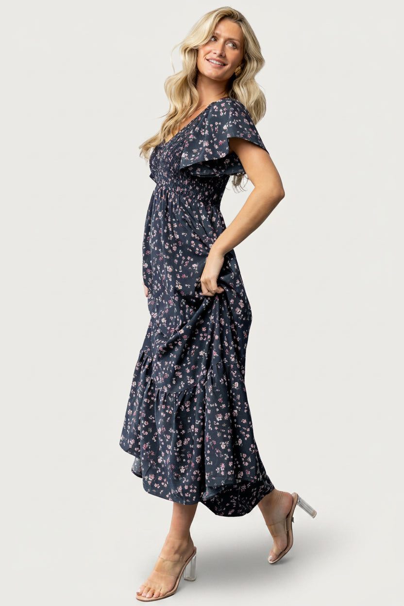 Close-up of the smocked bust and center seam detail on the Midnight Floral Jerah Smocked Dress.