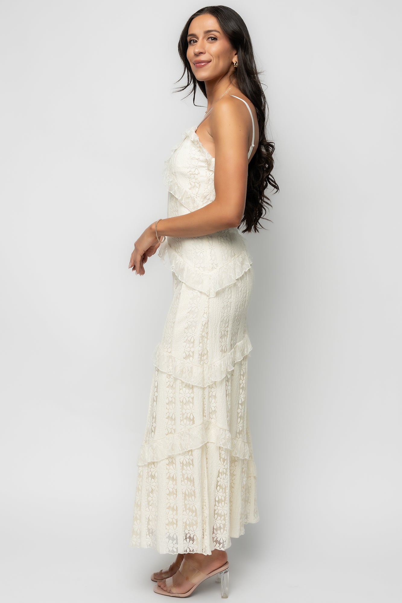 Close-up of adjustable elastic straps and V-neckline on the Annabelle Lace Maxi Dress in cream, showing lace overlay and smooth lining at the bust.