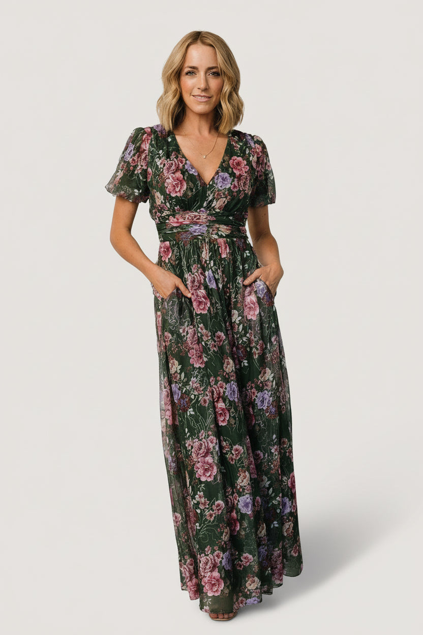 Full-length studio shot of Ardley maxi dress in green and pink floral on mannequin highlighting silhouette and sleeve shape.
