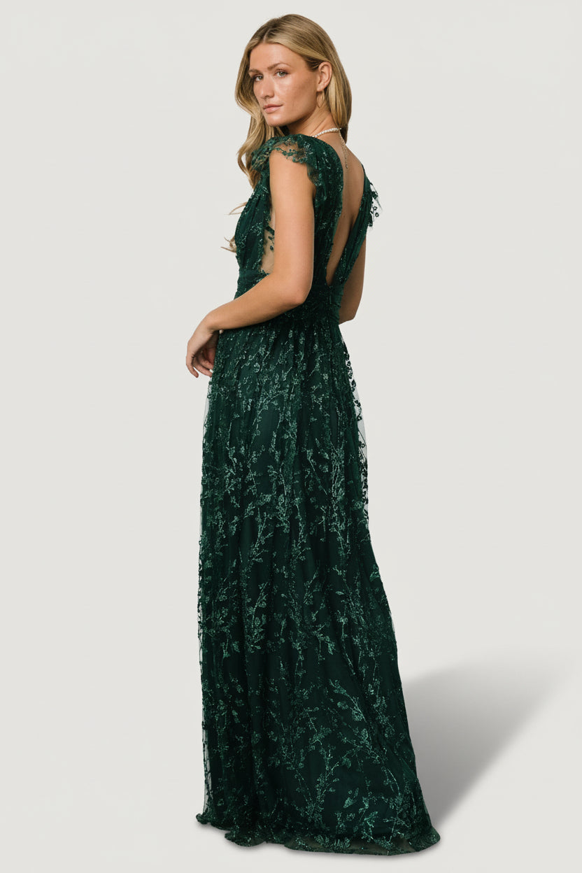 Full-length image of emerald Arlene Shimmer Gown showing shimmer tulle overlay, floral sequin detail, and elegant maxi silhouette ready for formal events.