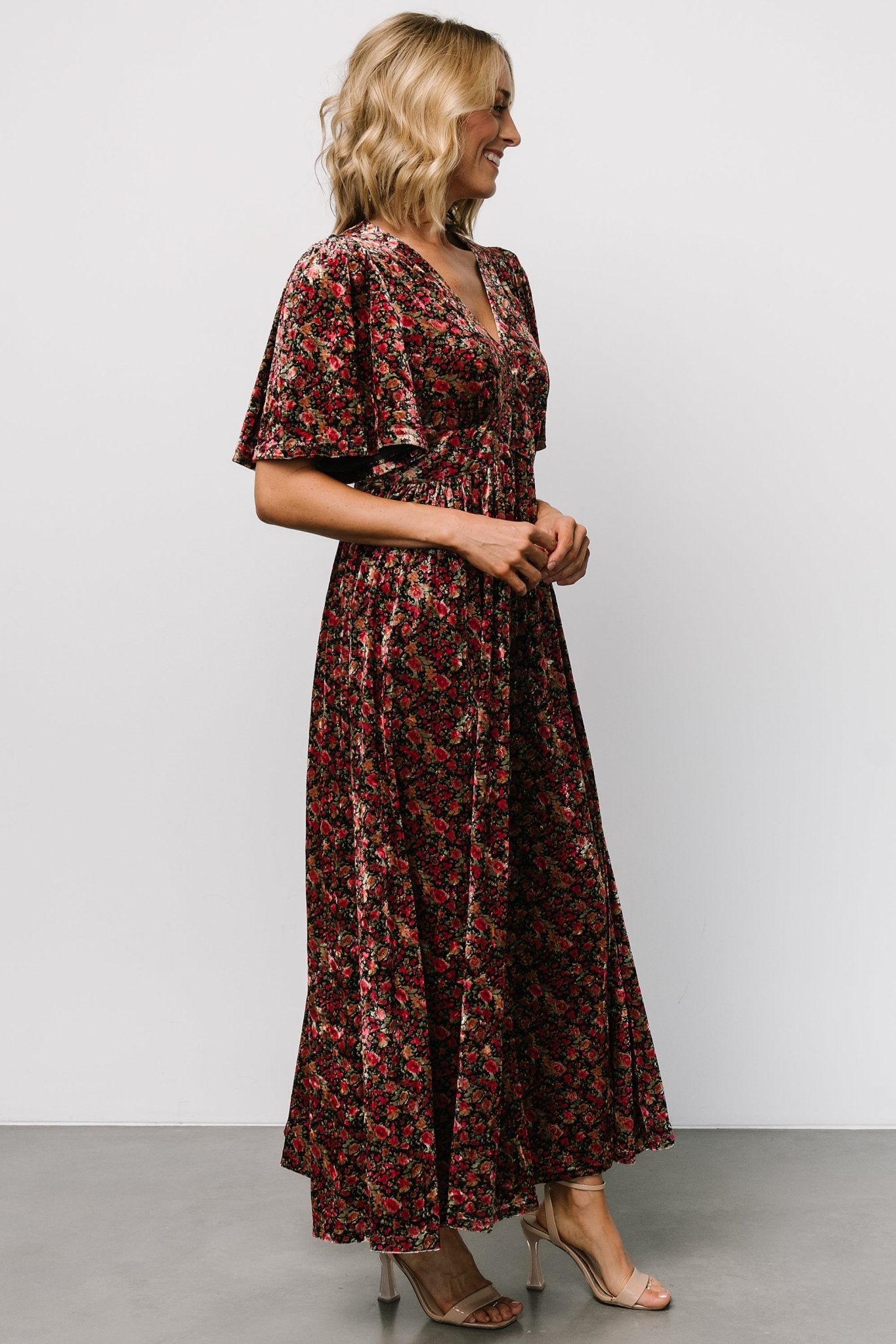 Close-up detail of the velvet fabric and metallic thread on the black multi floral Irina Maxi Dress, showing texture and print.