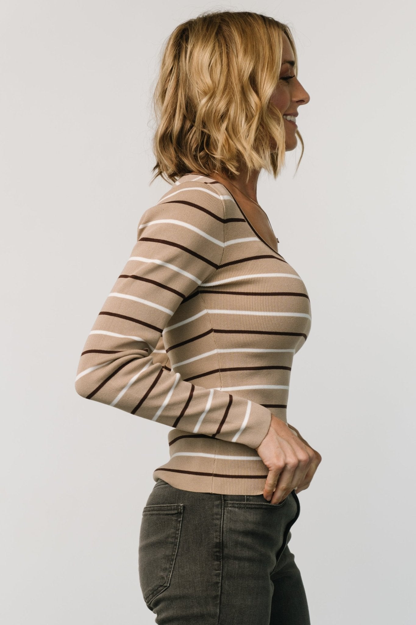Close-up of Kaylee top fabric and neckline, showing tight-knit viscose blend, neutral stripe pattern, and rounded-square collar details.