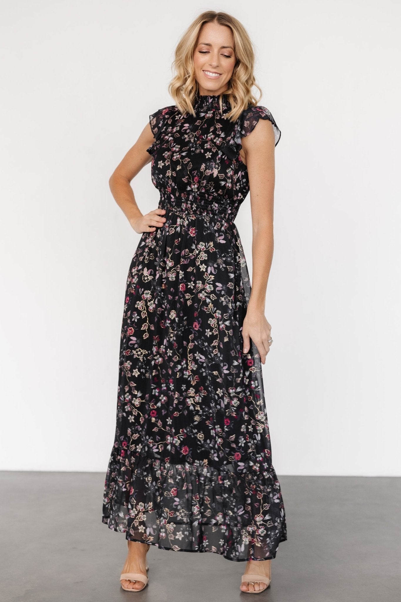 Styled shot of the Kearny Ruffle Maxi Dress in midnight + gold, illustrating movement, ruffle layers, and overall silhouette.
