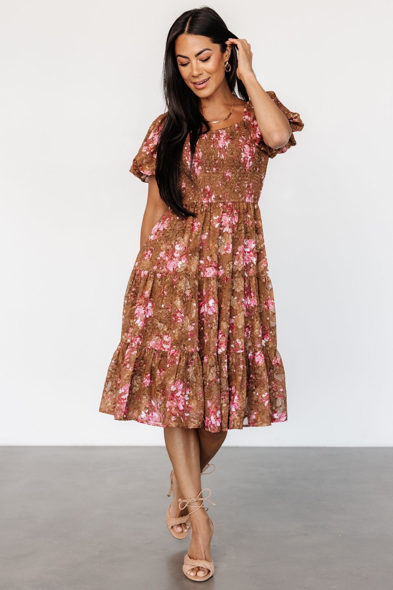 Styled detail of Lizzy midi dress fabric and embroidery, emphasizing the floral motif and lightweight chiffon overlay.