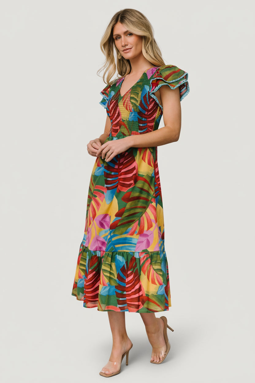 Back view of Marielle dress showing single-tiered midi skirt and gathered smocked back for comfortable fit.