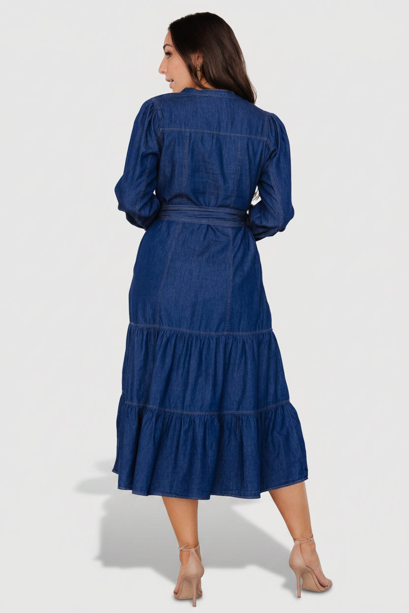 Model wearing Misty Midi Dress with removable belt tied at waist, showcasing silhouette and fit in denim blue.