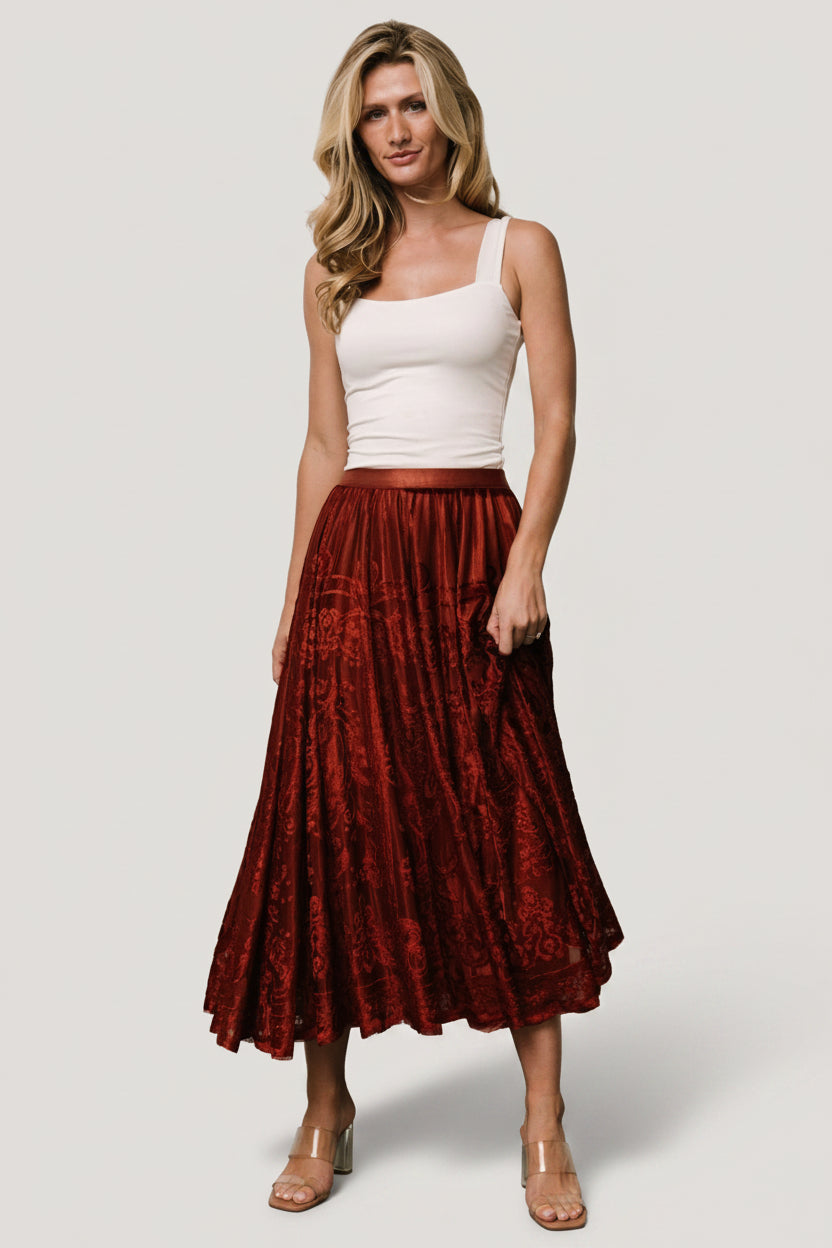 Back view of the Palini rust velvet burnout midi skirt, fully lined with a gentle A-line shape.