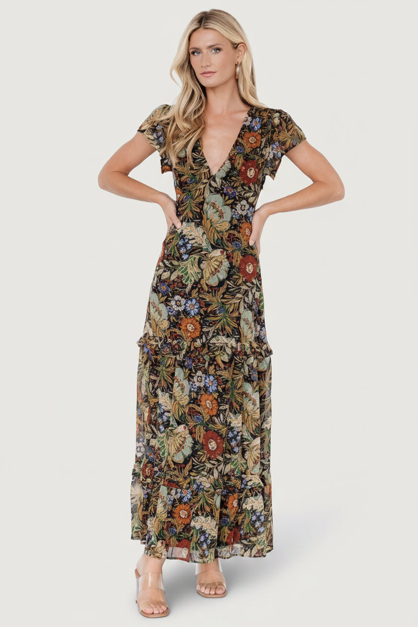 Back view showing elastic at the back waist, smocking at the shoulders and the dress’s full lining through the body.