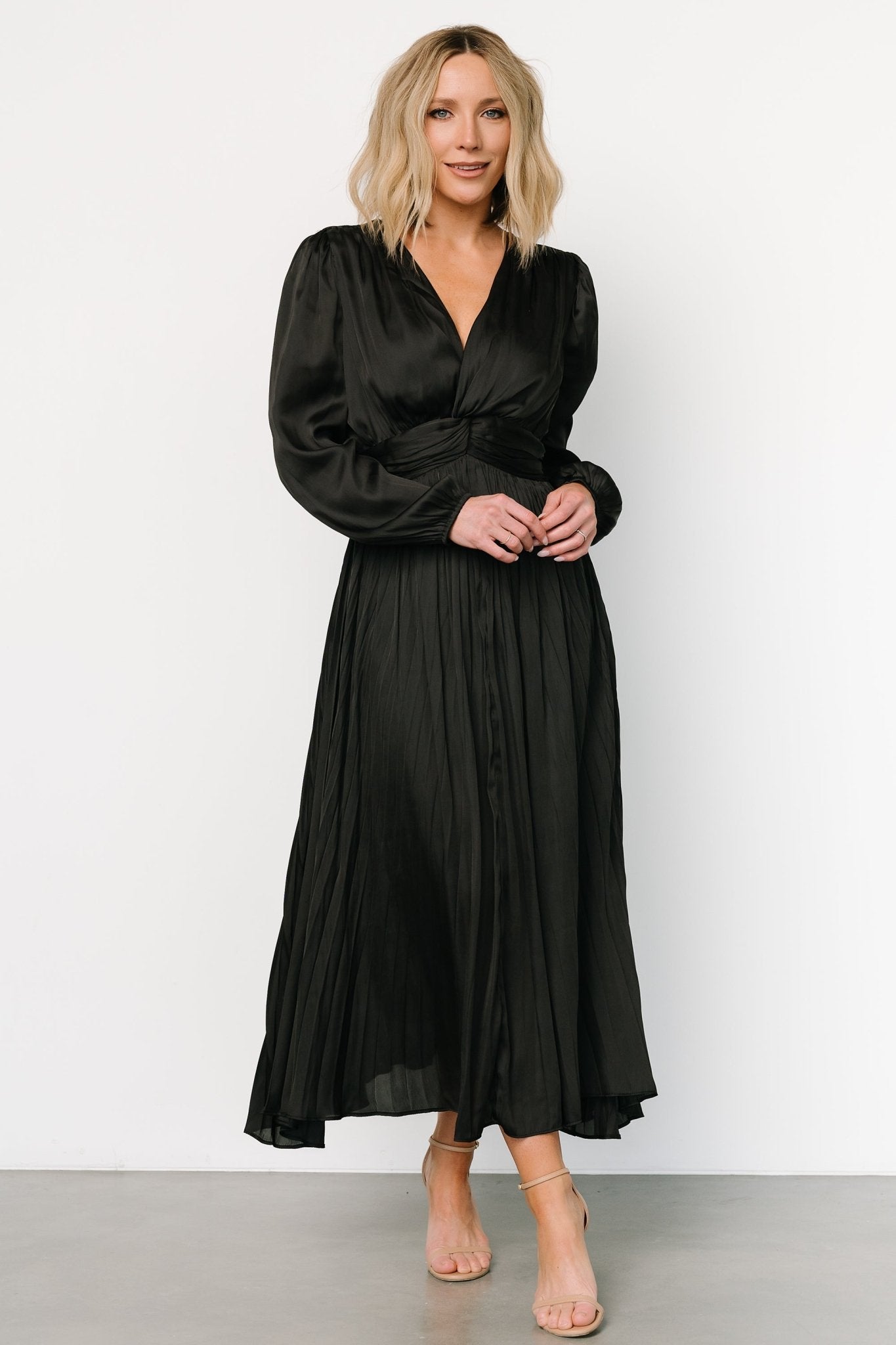 http://balticborn.com/cdn/shop/products/perla-pleated-midi-dress-black-929717.jpg?v=1709843901