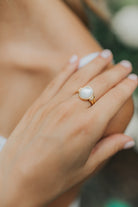 Detail view of the Broadwater ring's polished band and bezel setting, emphasizing the refined finish and smooth profile for comfortable wear.