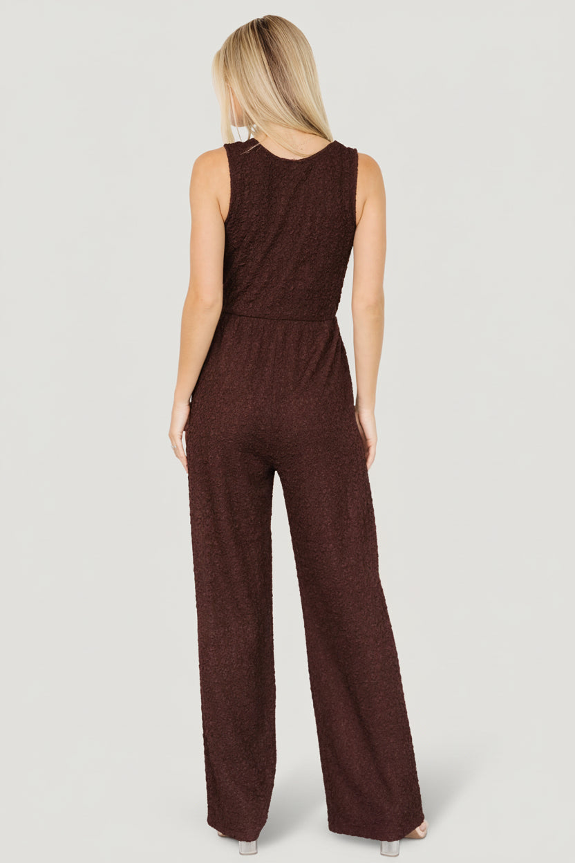 Detail shot of waist and pocket area showing the elasticized waist, side pocket entry and fine crepe weave with slight stretch.