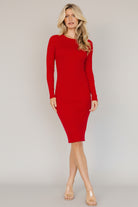 Detail view of sleeve and hem on the Mavis Ribbed Midi Dress in red, highlighting raw hem finish and the knit’s stretch and recovery.