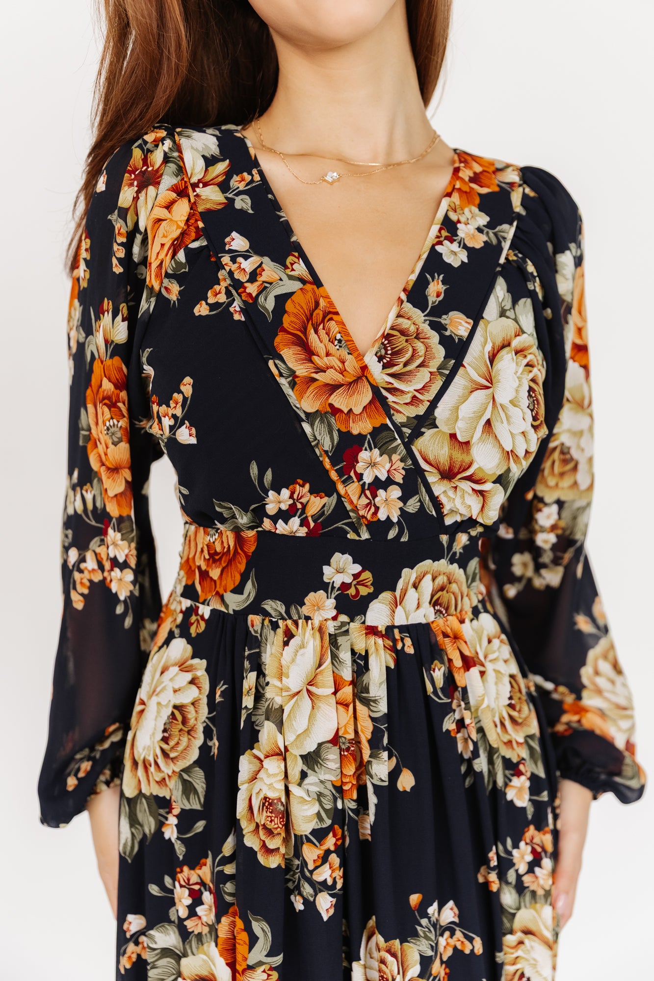 Styled look: Johanna Midnight Floral dress with simple heels, showing movement in the tiered skirt and delicate floral print.