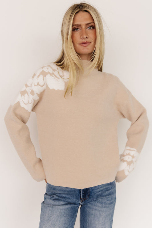 Front view of Oda Floral Sweater in natural with raised fuzzy ivory flower texture and boxy mock neckline, styled on model.