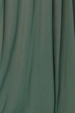 Close-up of Dark Sage Victoria chiffon fabric swatch on white background showing sheer, lightweight texture and soft drape for dressmaking.