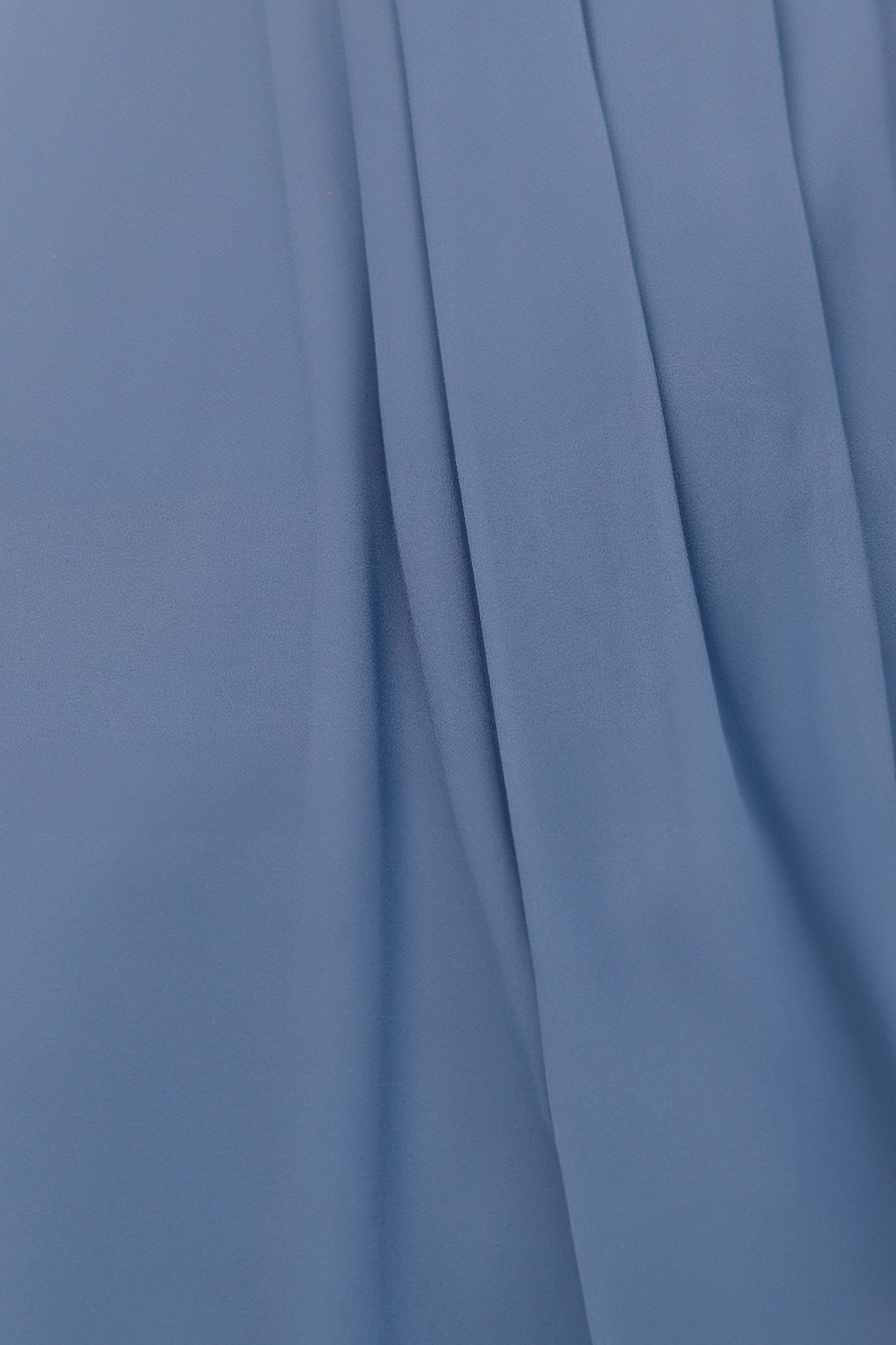 Whisper Blue Kia chiffon fabric swatch on white background showing lightweight, semi-sheer texture and soft drape for color evaluation.