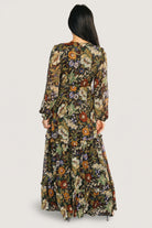 Back view of the Bowman Deep V Maxi Dress showing elastic back waist and the hidden left-side zipper for a smooth finish.