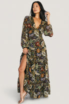 Front view of Bowman Deep V Maxi Dress in black multi floral, showing deep V-neck and ruffle-tiered skirt in flowing chiffon fabric.