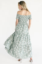 Side view of the Payton maxi showing hidden side pocket placement and the front slit for easy movement.