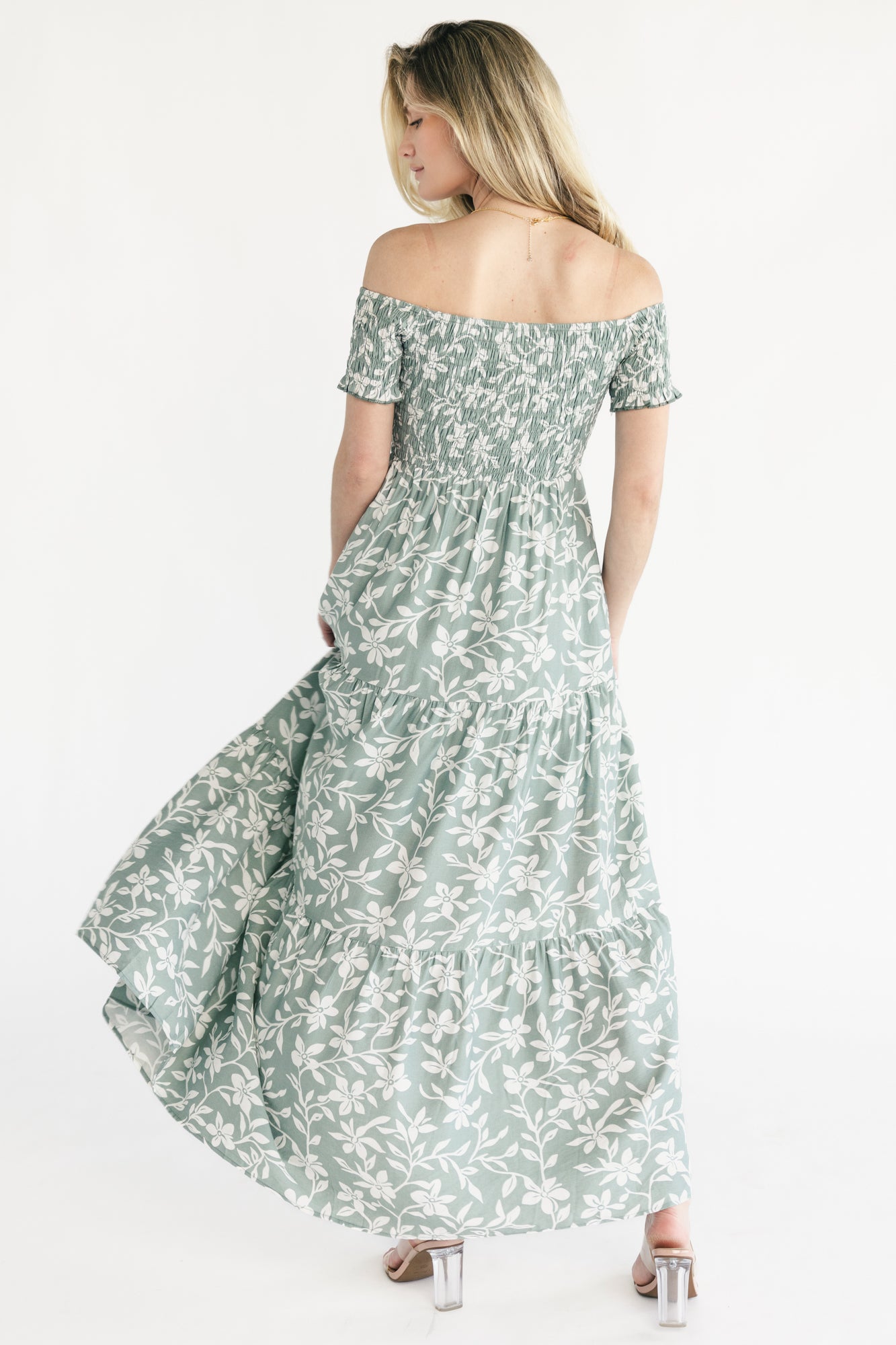 Side view of the Payton maxi showing hidden side pocket placement and the front slit for easy movement.