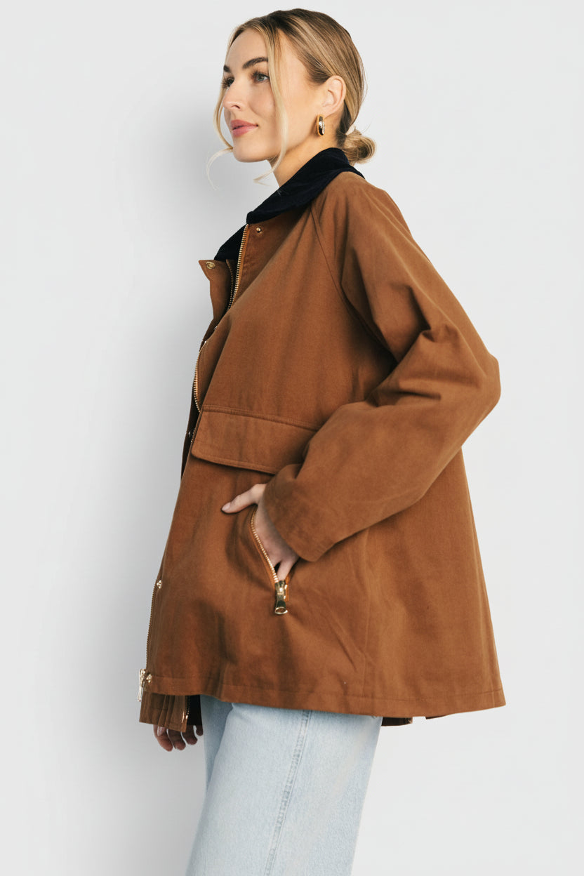 Interior view showing the 100% cotton plaid lining and finished seams that add warmth and a classic layered look.