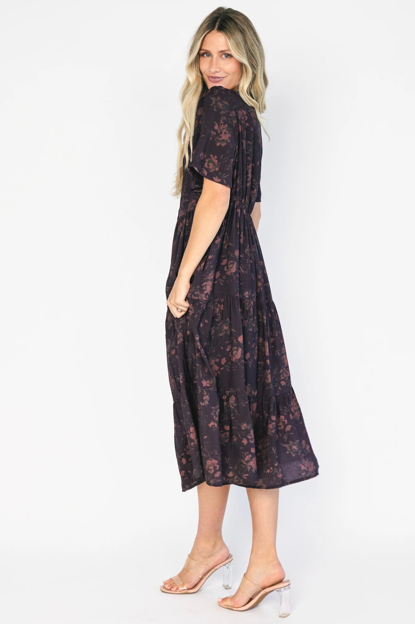 Annelise Midi Dress in Deep Plum with brown undertones, button-front V-neck, puff sleeves, and tiered midi skirt.