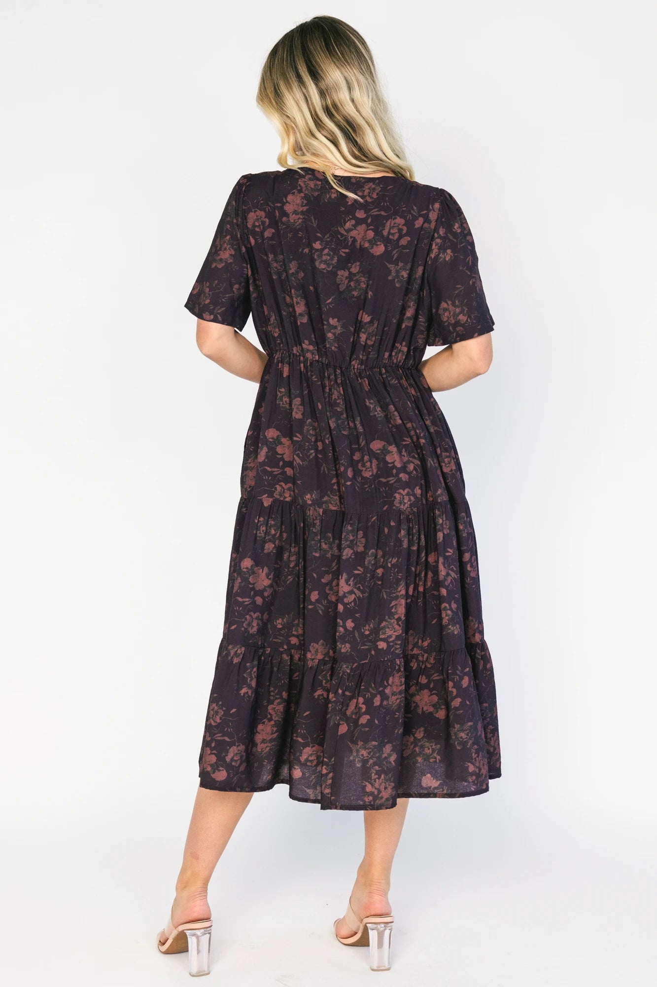 Annelise Midi Dress in Deep Plum with brown undertones, button-front V-neck, puff sleeves, and tiered midi skirt.