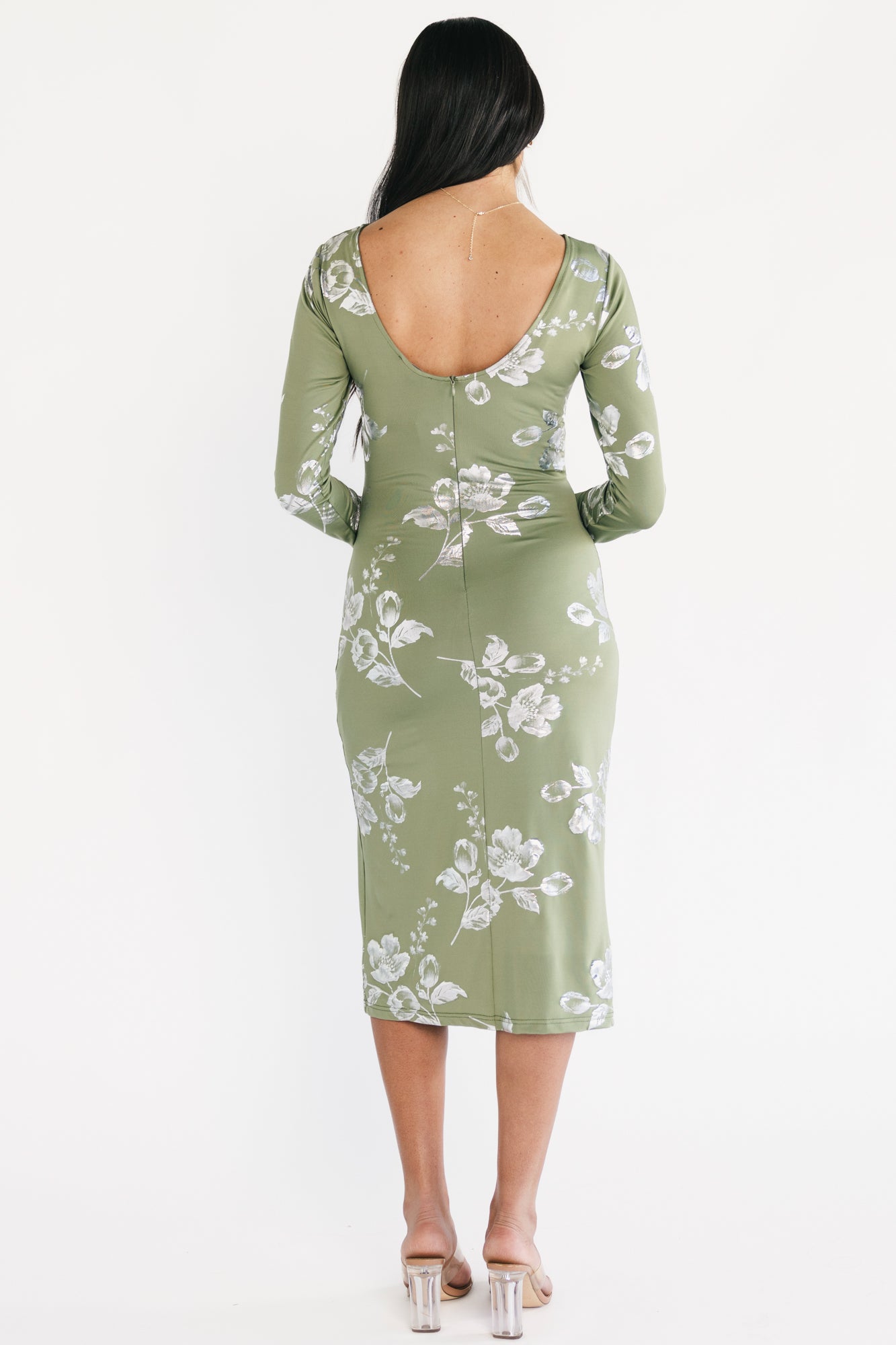 Close-up of the Valeria Midi Dress fabric showing silver metallic floral detailing and the luxe stretch knit texture.