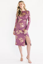 Front view of Valeria Midi Dress in Dusty Orchid & Gold showing boat neckline, metallic floral print on black knit fabric, and midi hem.