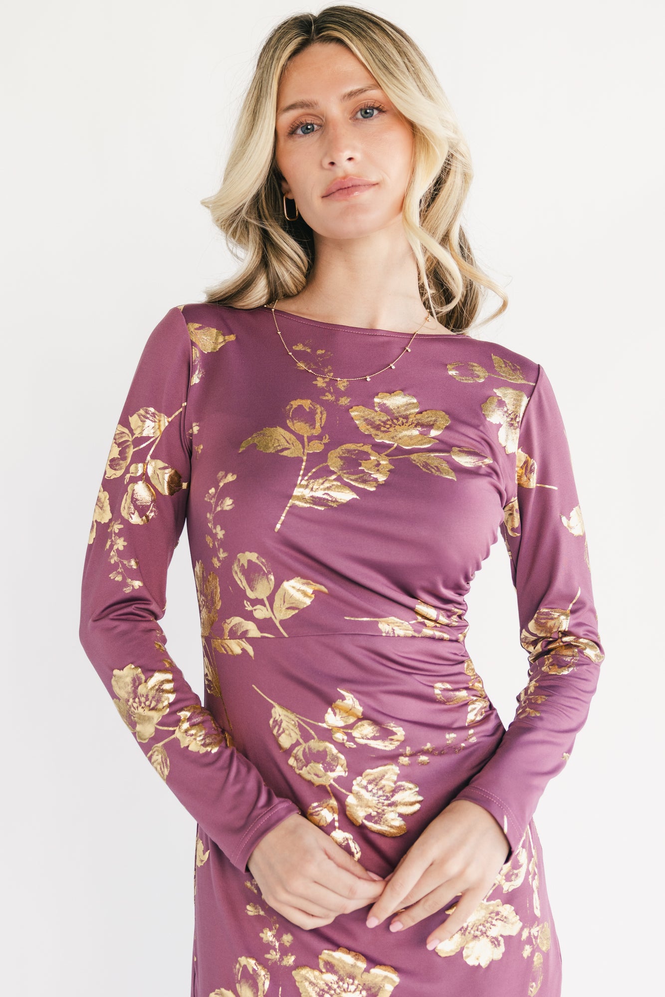 Side profile of Valeria Midi Dress highlighting gathered left-side detail, elastic front waist, and the left leg slit in Dusty Orchid & Gold.