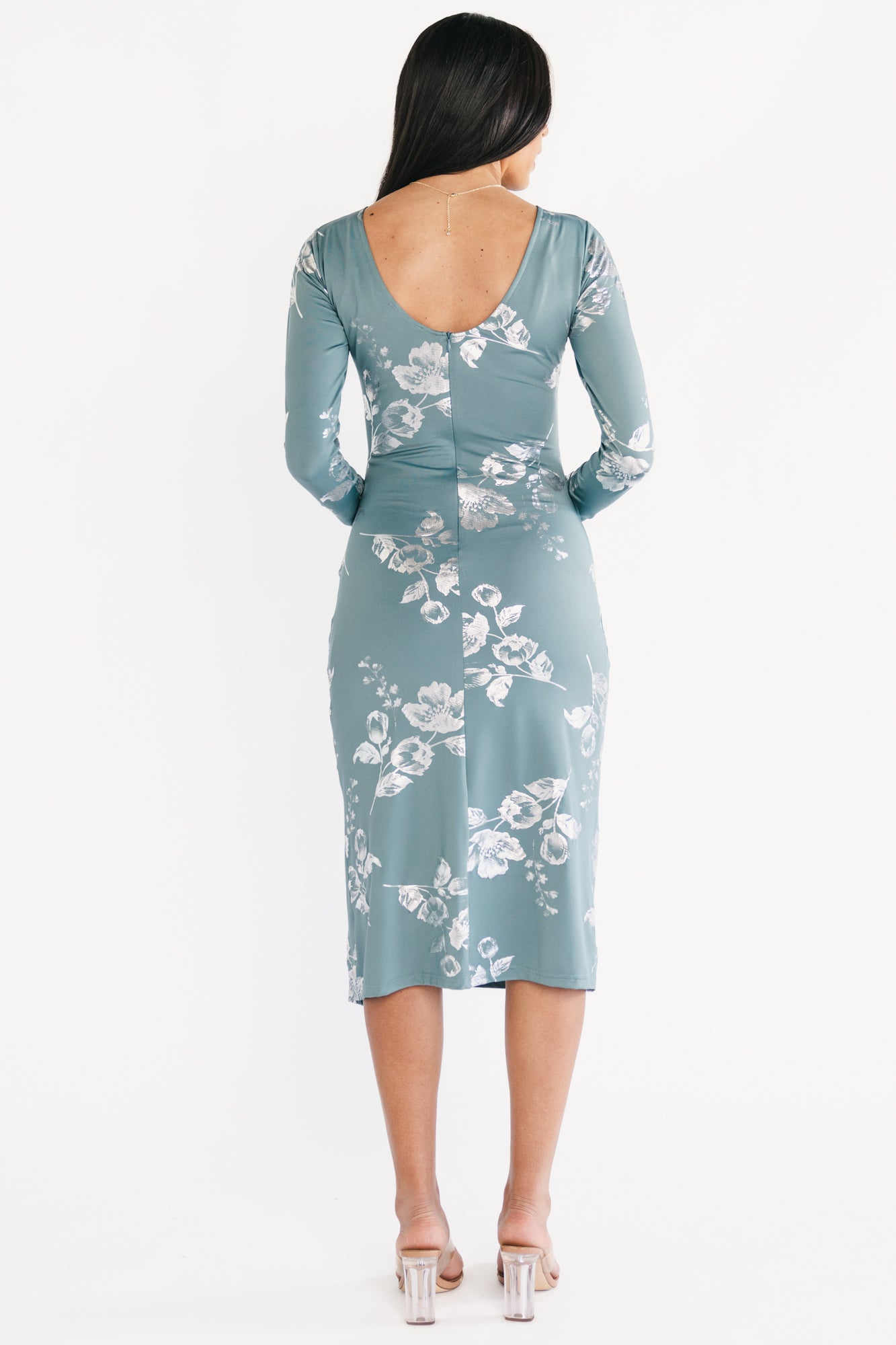 Side profile of Valeria Midi Dress in vintage teal, showing gathered left-side drape, elastic front waist and left leg slit movement.