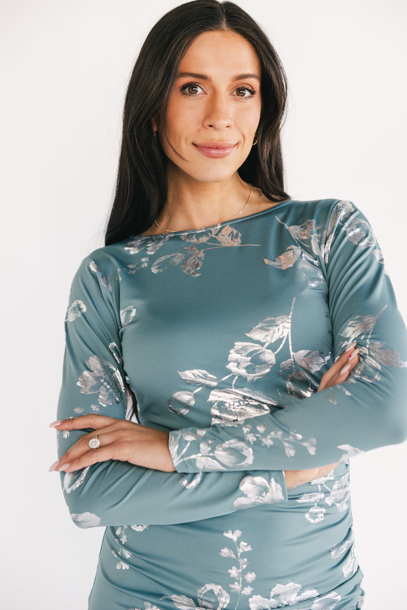 Back view showing scoop back and hidden zipper on the Valeria Midi Dress in vintage teal with metallic floral pattern and fitted bodice.