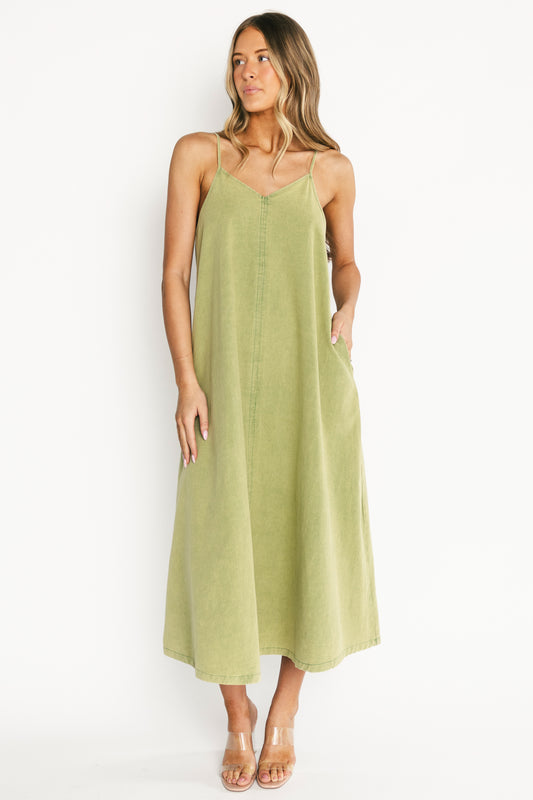 Front view of Marcia Maxi Dress in green wash showing V-neckline, adjustable tank straps, hidden side pockets, and full maxi hem.