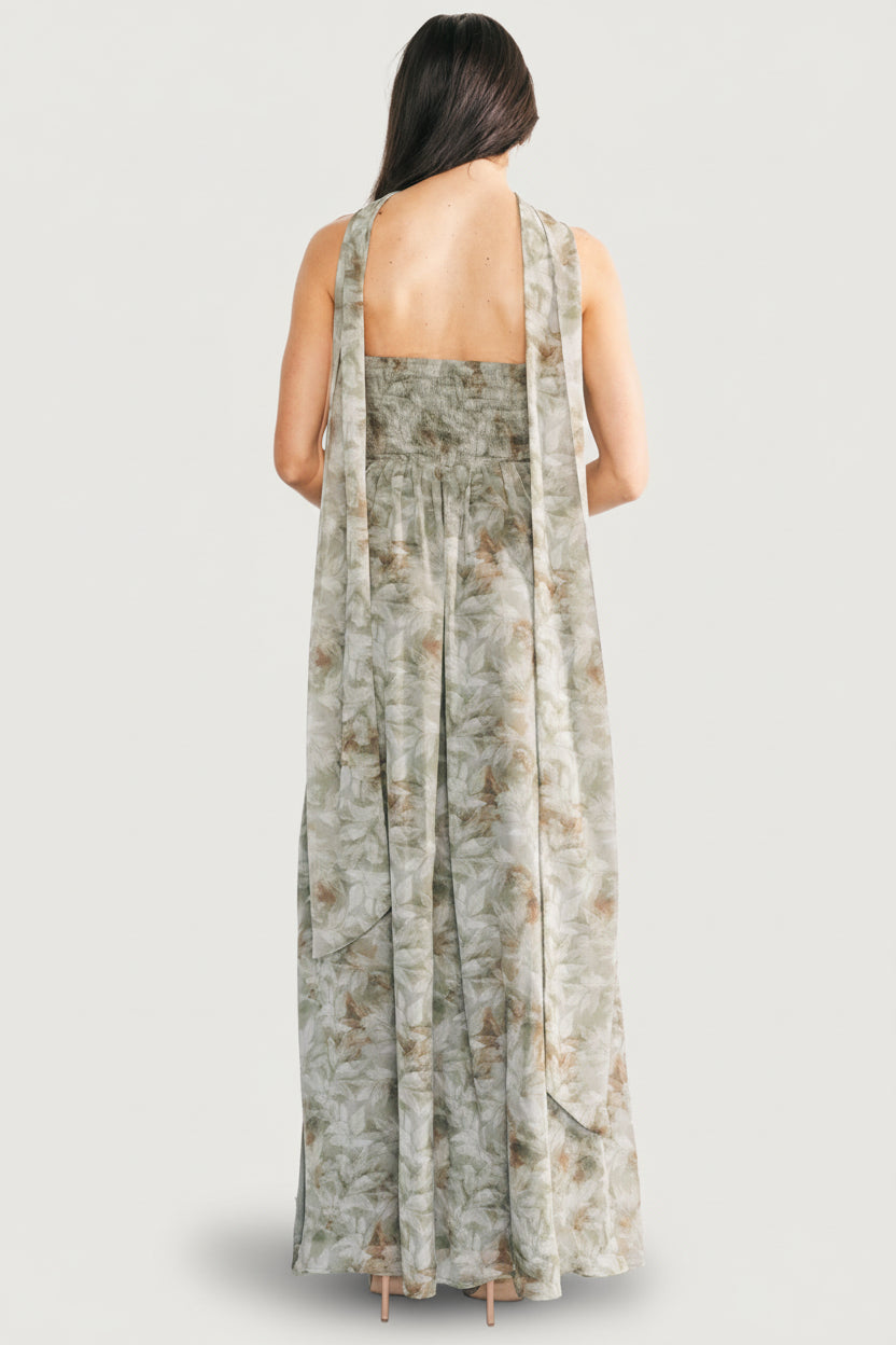 Detail shot of lightweight chiffon fabric and floral print with a glimpse of the fully lined interior of the Florian strapless maxi.