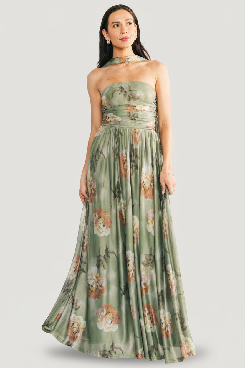 Three-quarter view of model wearing the dark sage floral Elias strapless maxi, highlighting side seam, mesh texture, and floral print scale.