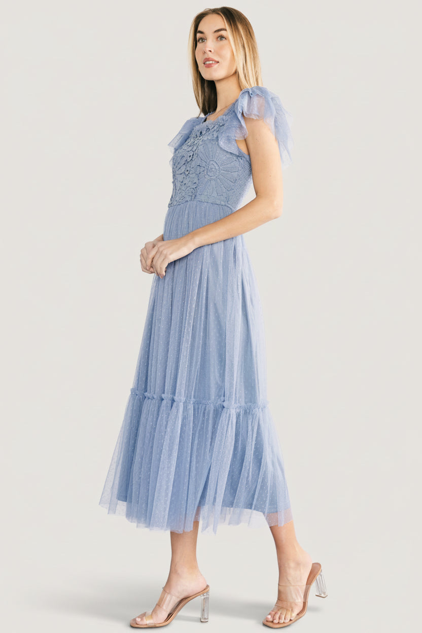 Close-up of lace overlay and Swiss dot mesh on the Elowyn bodice with delicate lace trim and textured mesh detail in soft blue.
