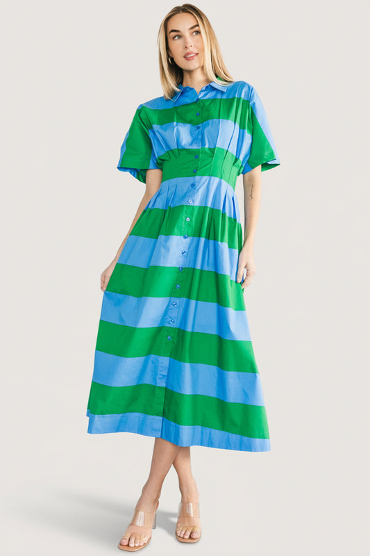 Front view of blue and green striped Tracy Shirt Dress on model, midi length, tailored waist pleating and lapel collar visible.