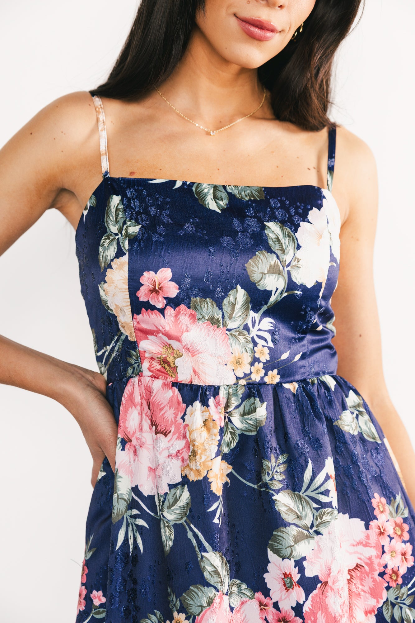 Detail shot of single tiered skirt and hemline, showing full lining to last tier and smooth drape.
