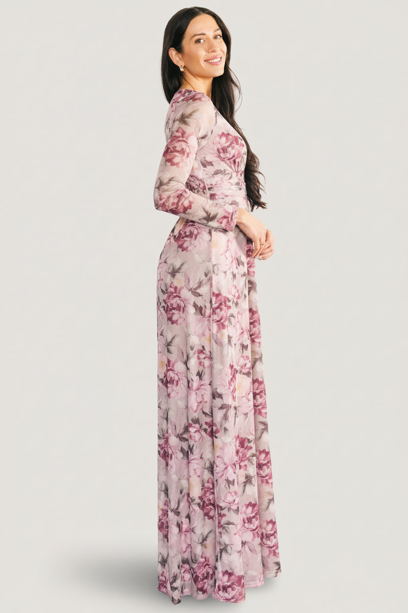 Model seated in Fable Mesh Maxi Dress showing maxi length, flow, and how the dress moves for occasion wear.