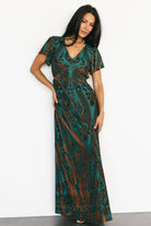 Back and side profile of the Kimberly maxi dress displaying the empire seam and graceful hem movement.