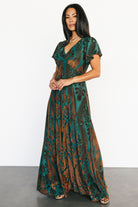 Styled flat-lay and hanging shot of the Kimberly velvet maxi dress showing full length, lining, and velvet pattern.
